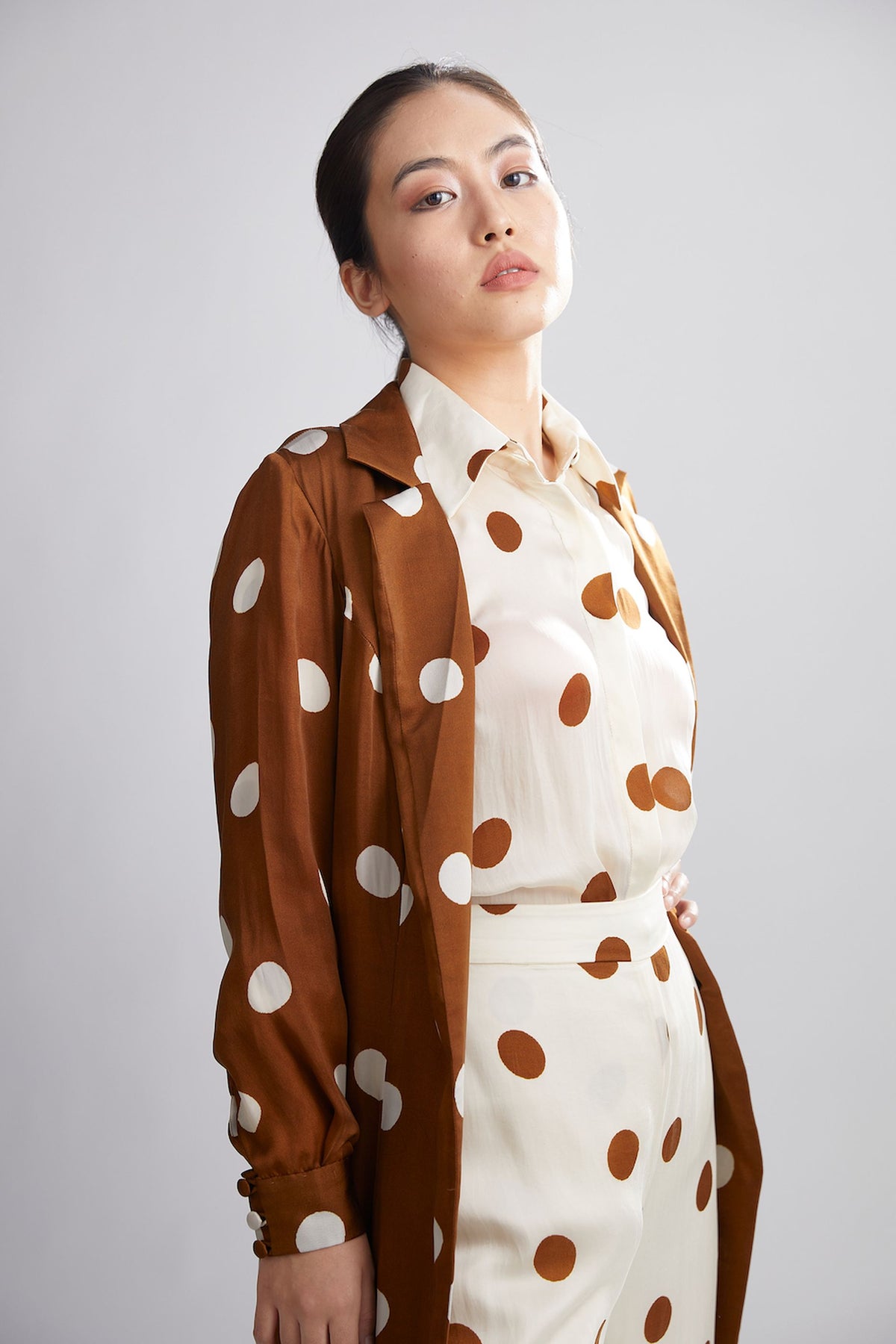 BROWN AND CREAM POLKA DOT TRENCH CAPE
