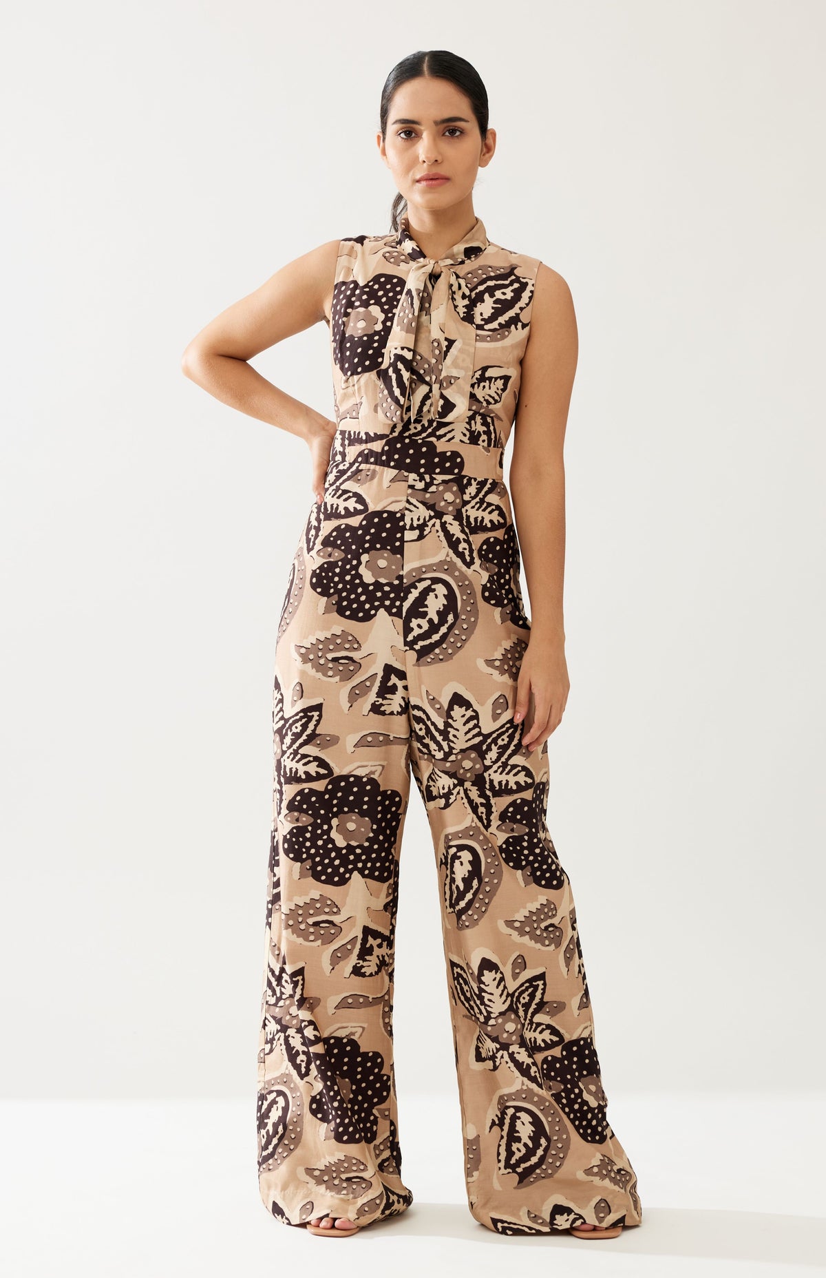 CREAM AND DARK BROWN FLORAL BOW TIE JUMPSUIT